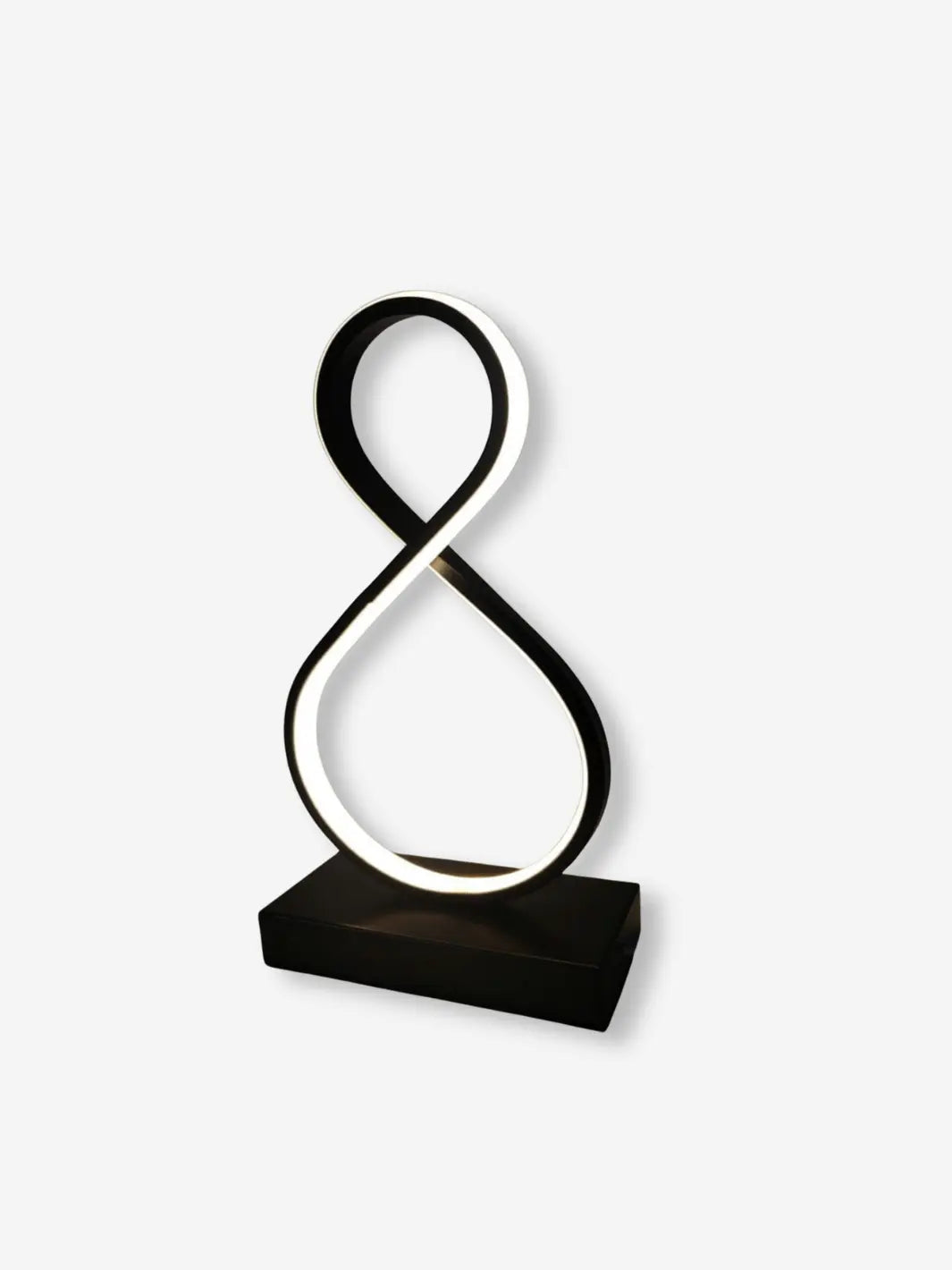 Lampe de chevet LED design original et moderne formant un huit de couleur blanche 