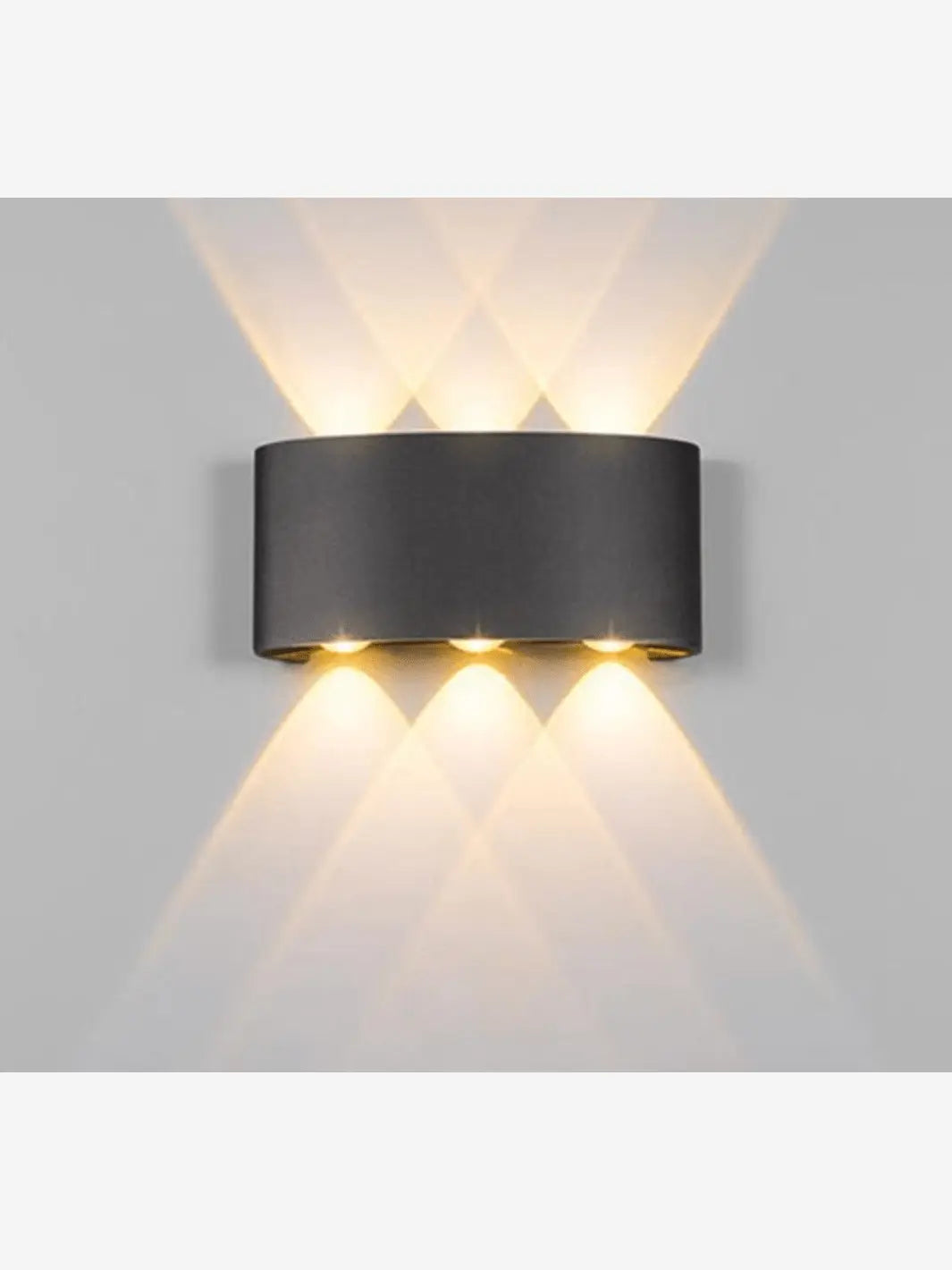 Lampe de chevet murale noire en métal qui éclaire
