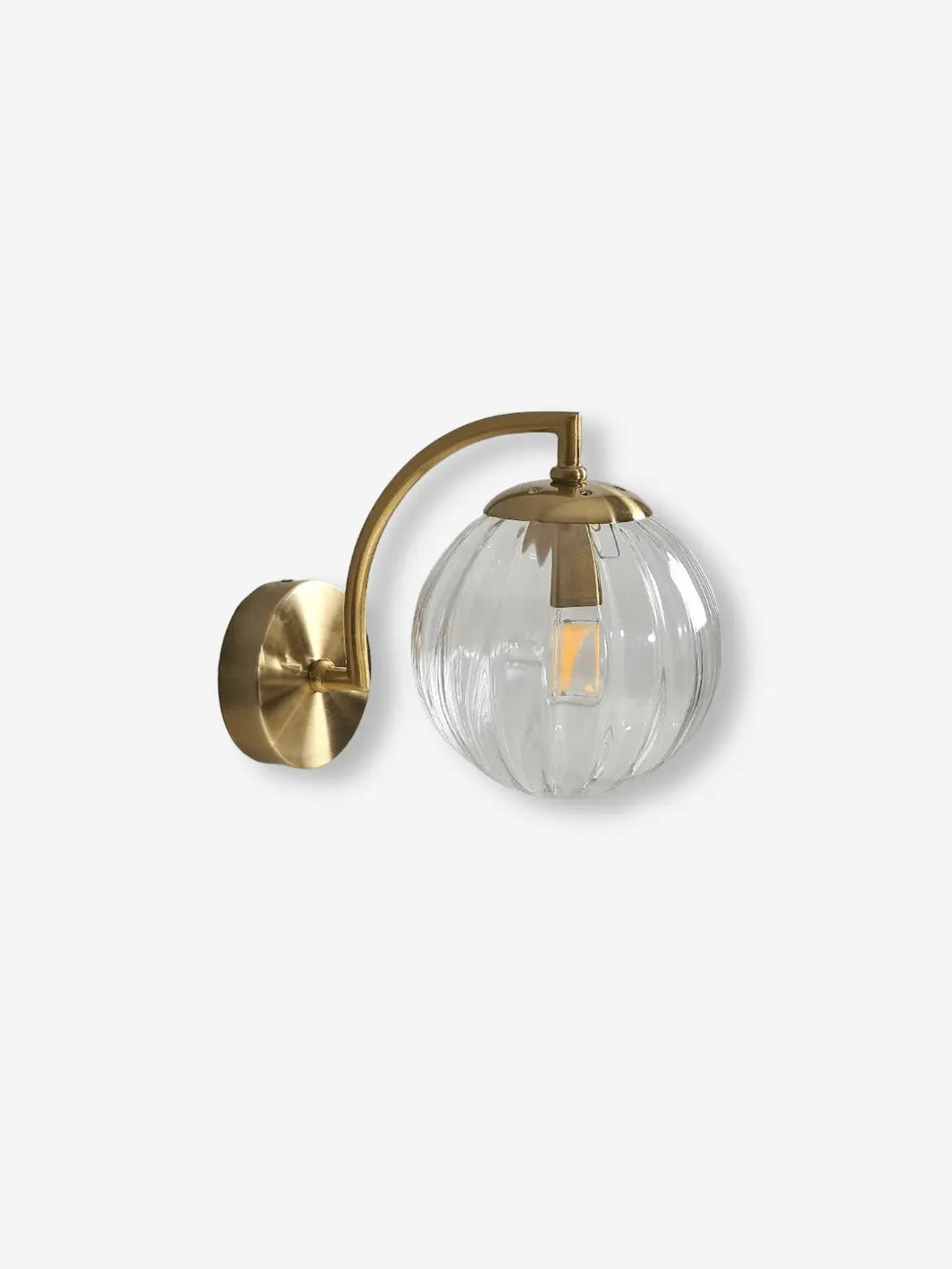 lampe de chevet murale moderne et design avec socle couleur or et bulle lumineuse transparente