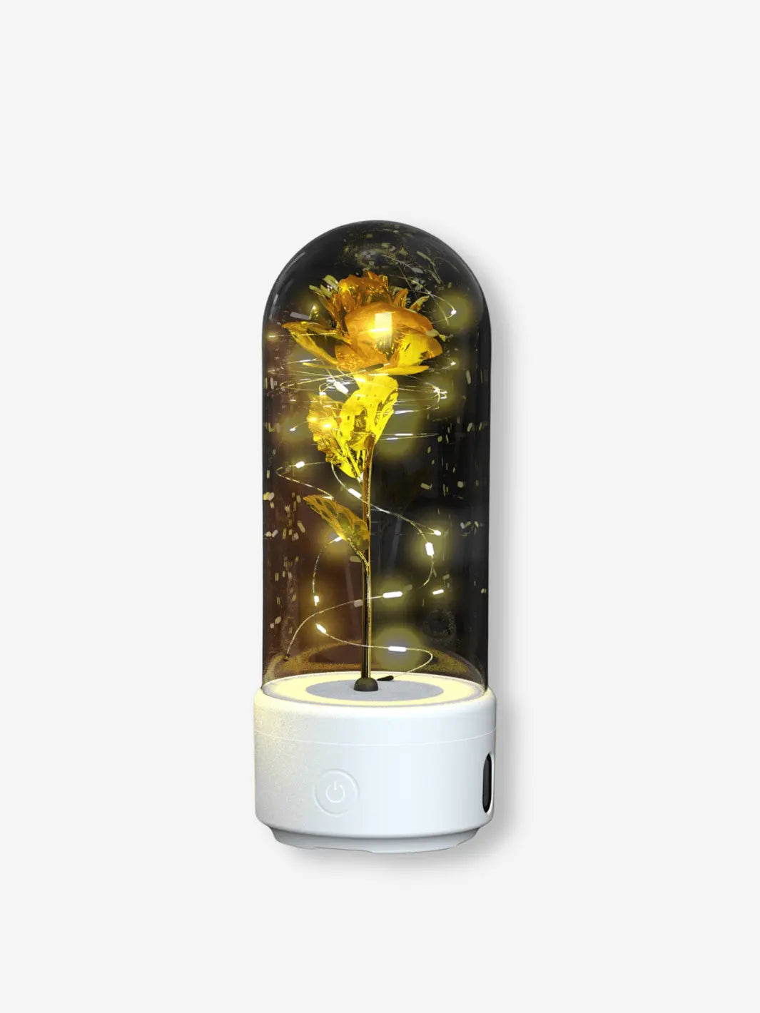 Lampe de chevet romantique avec bluetooth en forme de rose dorée sous cloche sur son socle blanc