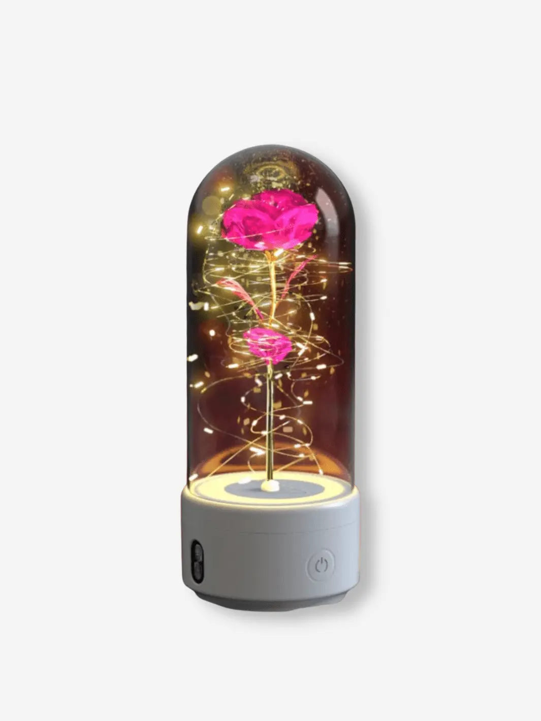 Lampe de chevet romantique avec bluetooth en forme de rose sous cloche sur son socle blanc
