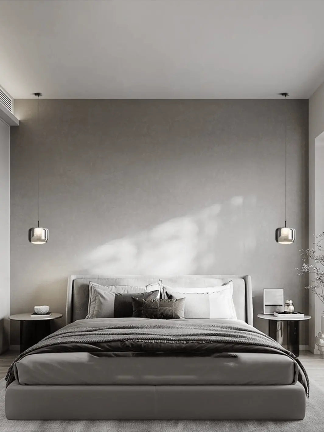 Lampe de chevet suspendue en argent dans une chambre